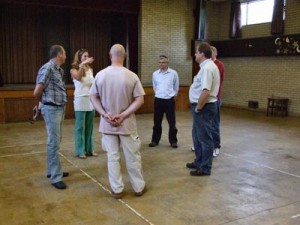 Jane talking to the group at the working mens club (Photo Copyright Evil Jam)
